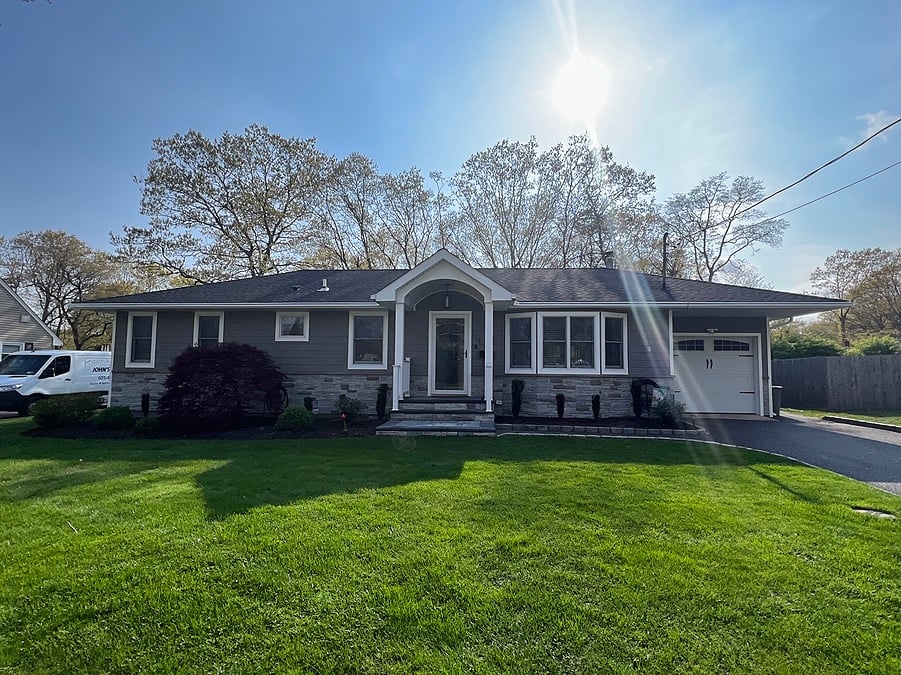 One-story exterior home remodel in Patchogue, NY by Kuhn Construction