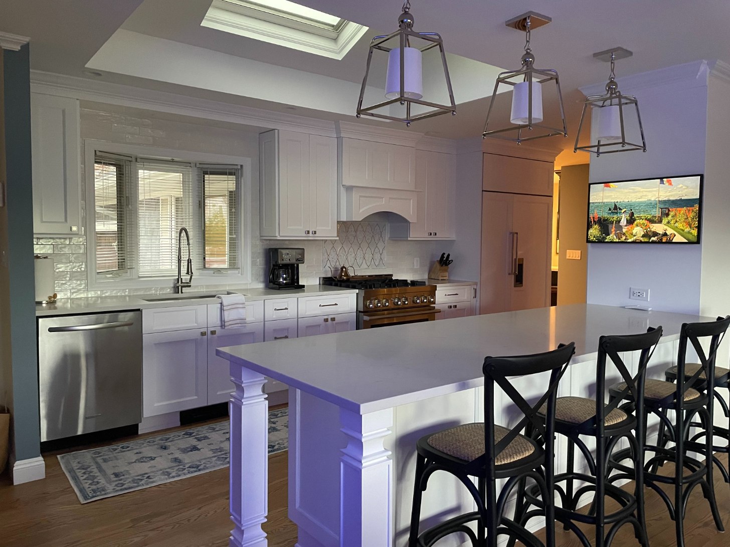 Islip, NY kitchen remodel with skylight above island by Kuhn Construction