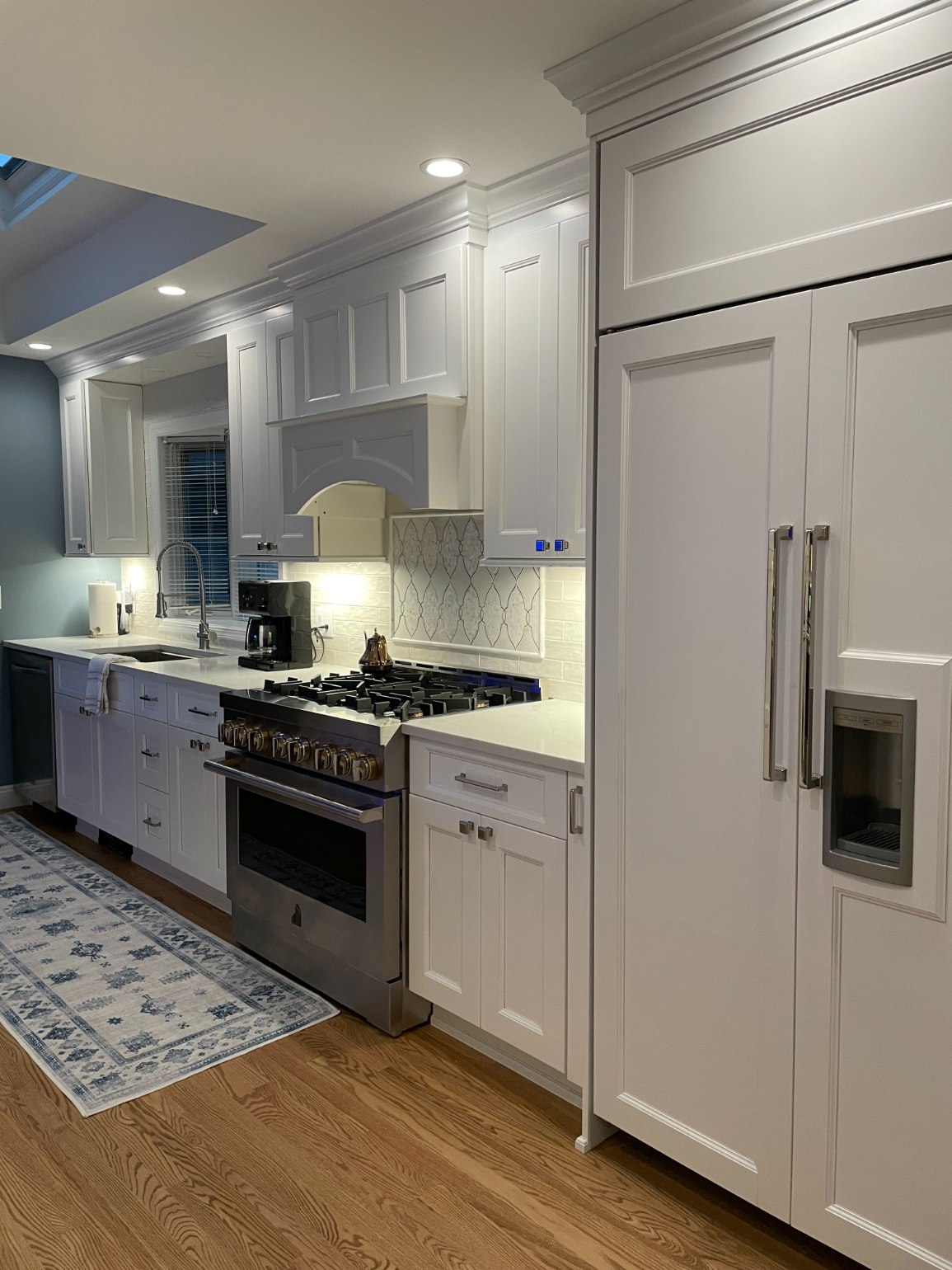 White kitchen cabinets in Islip, New York kitchen remodel by Kuhn Construction