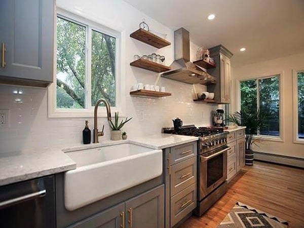 Farmhouse style sink set with grey cabinets in Islip, NY kitchen remodel by Kuhn Construction