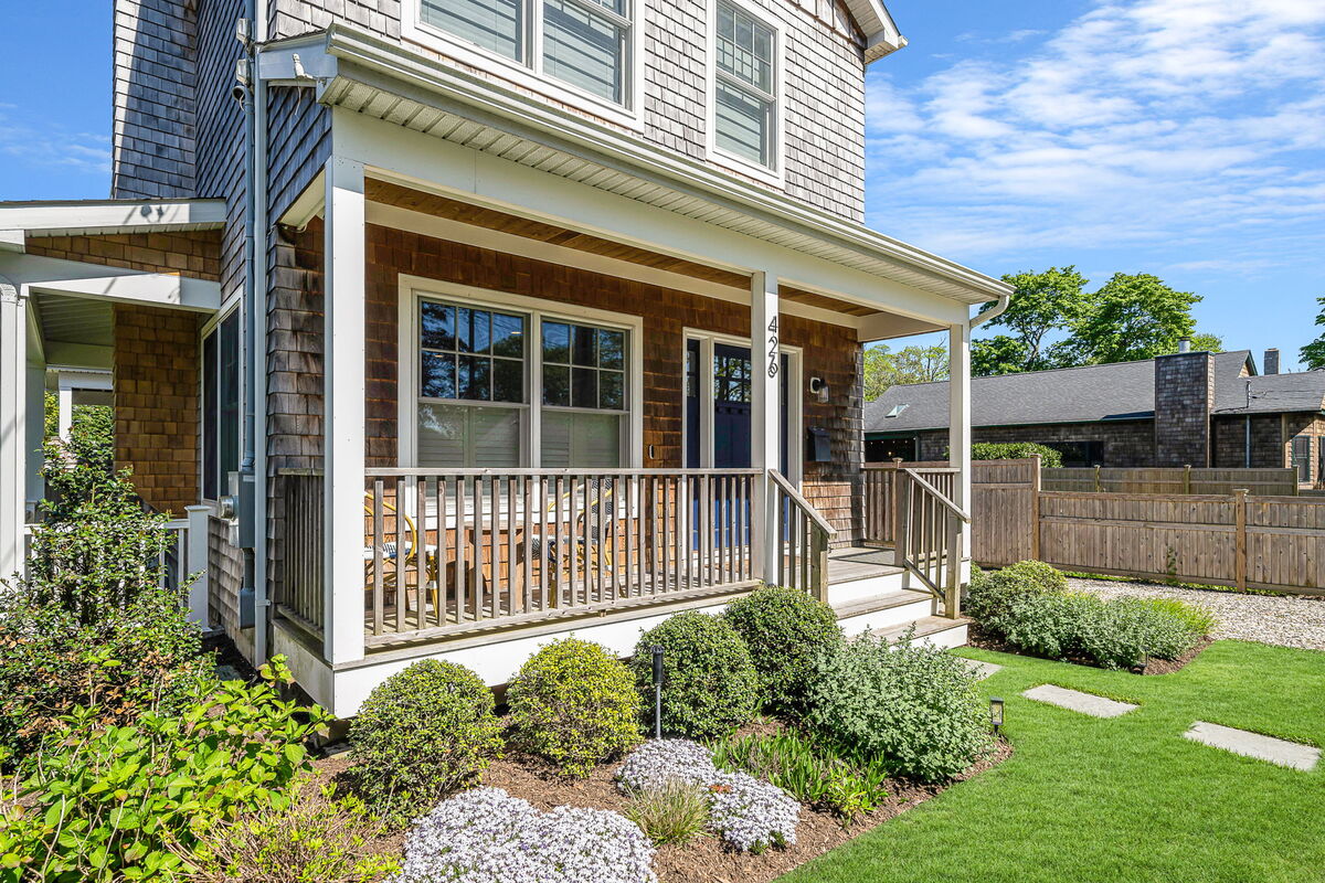 Suffolk County home exterior with front porch by Kuhn Construction