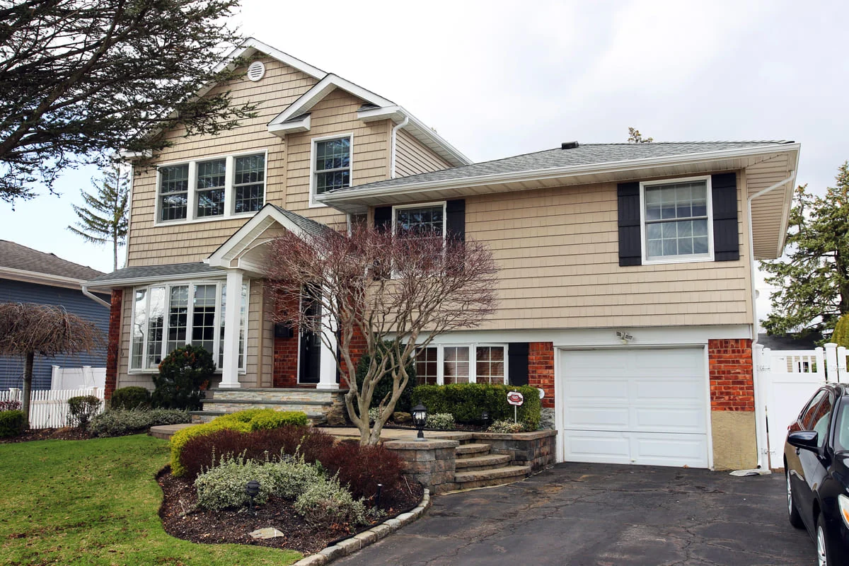 Islip, NY home addition exterior on second story by Kuhn Construction