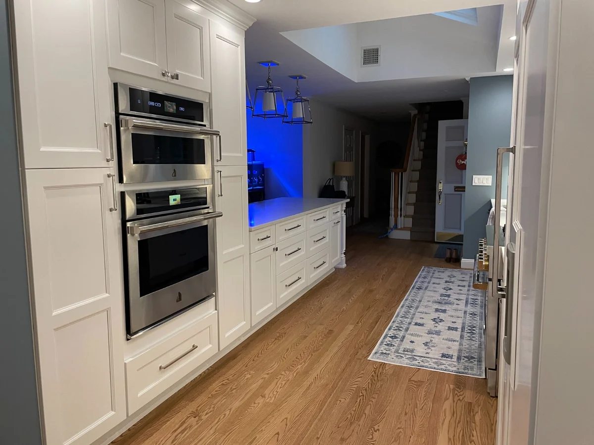 Islip, NY kitchen remodel with white shaker cabinets by Kuhn Construction