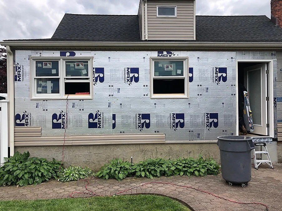 New window installation in Hicksville kitchen remodel by Kuhn Construction